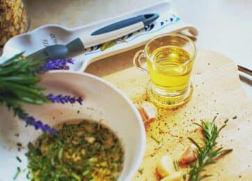cooking oils and herbs on a dish