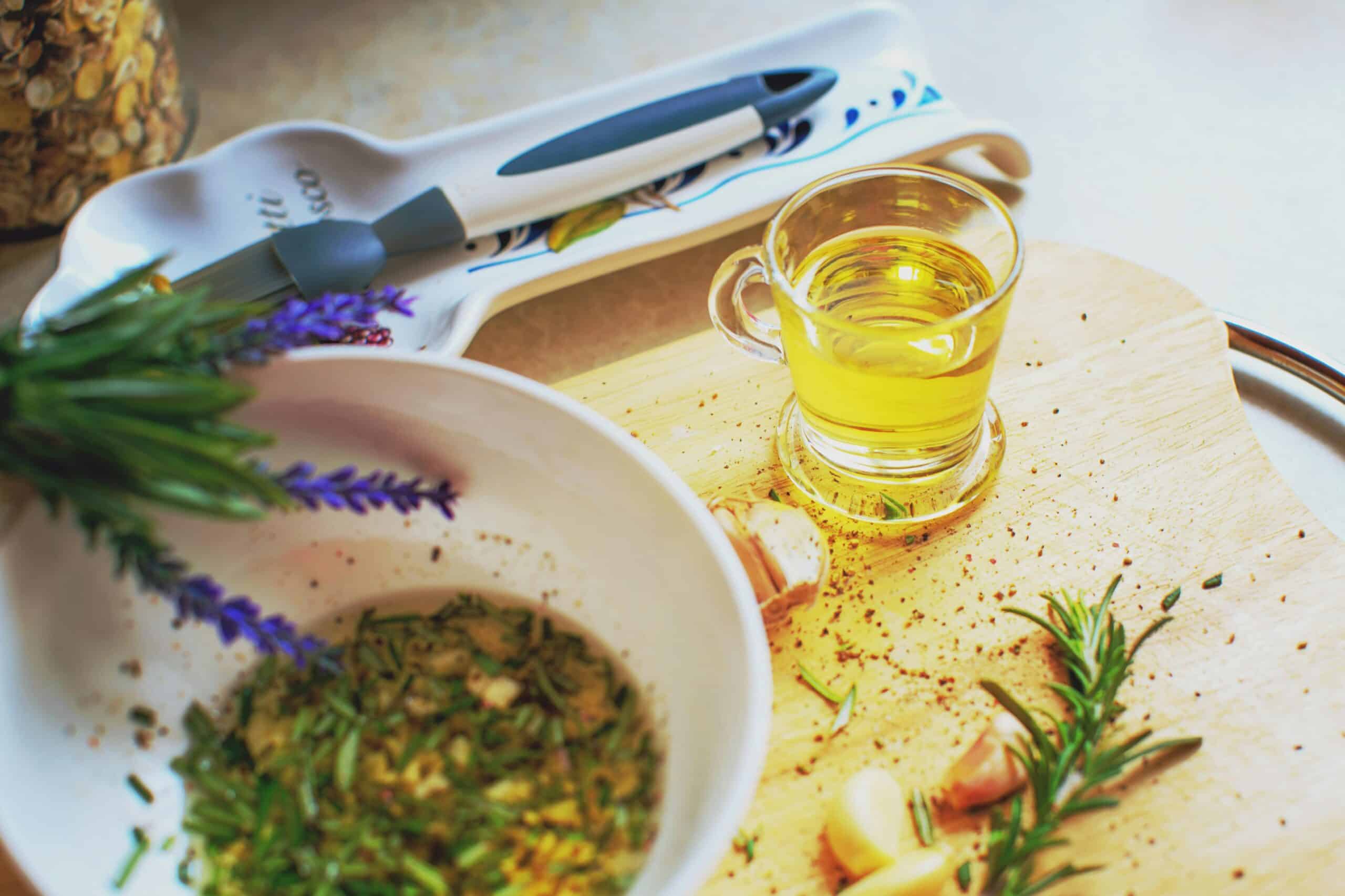 cooking oils and herbs on a dish